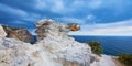 Panoramic ocean view. Stormy blue sky and Rocky terrain. Nature scenery of Summer time. Chalk mountains. Royalty Free Stock Photo