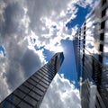 Panoramic and perspective view to steel light blue background of glass high rise building skyscraper city of future Royalty Free Stock Photo