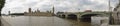 Panoramic photo of the houses of parliament and Westminster bridge in London. Royalty Free Stock Photo