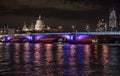 Panoramic photo of the London skyline at night, showing The River Thames, Blackfriars Bridge and St Paul`s Cathedral Royalty Free Stock Photo