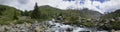 Panoramic photo of mountain landscape in Valtellina, Viola river Royalty Free Stock Photo