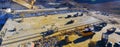 Panoramic photo. Production machines and equipment in quarry for Royalty Free Stock Photo