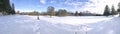 Panoramic photo of the public park on deep snow with footprint for a winter weather concept