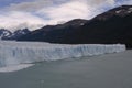 Panoramic photo of tourists on the observation deck looking at Perito Moreno Glacier. Argentina, Los Glaciares National Park Royalty Free Stock Photo