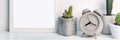 Panoramic photo of white mockup frame with cacti and a round concrete clock Royalty Free Stock Photo