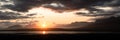 Panoramic picture of beautiful sunset in the mountains over a river valley in Iceland Royalty Free Stock Photo
