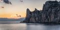 Panoramic picture of evening sunset over the Caraul-Oba mountain, Novy Svet, Crimea Royalty Free Stock Photo