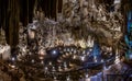 Panoramic picture of Melidoni Cave on crete island with altar and stone cross without people