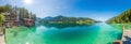Panoramic picture over Weissensee lake in Austria with turquoise water from view point Ronacher Fels in summer Royalty Free Stock Photo