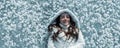 Panoramic portrait of beautiful, young, sexy, cute, brunette woman, freezing in the cold winter in white coat and hood, lying on Royalty Free Stock Photo