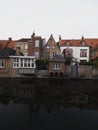 Panoramic reflection view of river canal channel in historic city center Bruges West Flanders Flemish Belgium Europe