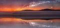 Panoramic reflection on water. Sunrise on distant hill with misty fog and milky way night sky. Czech landscape. Elements furnished