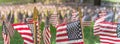 Panoramic row of lawn American flags display on green grass on Memorial Day in Dallas, Texas, USA Royalty Free Stock Photo