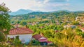 Panoramic rural landscape with village and valley