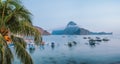 Panoramic scene of trip tourist boats in El Nido at evening sunset light. Palawan, Philippines. Cadlao island in Royalty Free Stock Photo