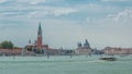 Panoramic sea view of the San Giorgio Maggiore island and basilica Santa Maria della Salute timelapse in Venice, Italy. Royalty Free Stock Photo