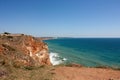 Panoramic sea view from a sandy mountain cliff, Cape Kaliakra Bulgaria, sea horizon, bright sunny seascape, blue sky and turquoise Royalty Free Stock Photo