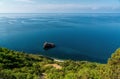 Panoramic seascape, calm azure sea, clouds and bright sky. View of the Black Sea coast in Crimea, Cape Fiolent in Sevastopol. Copy