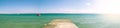 Panoramic seascape with turquoise sea and pier at sunny day. Chalkidiki also spelt Chalkidike, Chalcidice, Khalkidhiki or Royalty Free Stock Photo