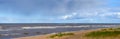 Virgin panoramic seascape with clouds and small waves in Baltic sea