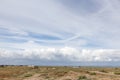 Panoramic seaside scenery with storm clouds in the horizon Royalty Free Stock Photo
