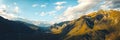 Panoramic shot of beautiful autumn mountain landscape at sunset, aerial view Royalty Free Stock Photo