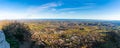 Panoramic shot of a beautiful town placed in a hilly area next to a sea