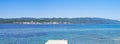 Panoramic shot of boats on the sea with buildings background in Rabac City, Croatia Royalty Free Stock Photo