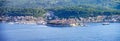 Panoramic shot of boats on the sea with buildings background in Rabac City, Croatia Royalty Free Stock Photo