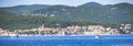 Panoramic shot of boats on the sea with buildings background in Rabac City, Croatia Royalty Free Stock Photo