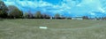 A panoramic shot of cricket being played in New Bradwell Park
