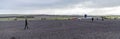 Panoramic shot of detectorists looking for ancient metal on the fields in Denmark Royalty Free Stock Photo