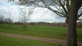 Panoramic Shot Of Early Spring Natural Parck in Swonly, East Kent of London. Hapy Family Walking At The Park. Narure