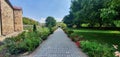 Panoramic shot of an empty pathway by the Mesic Monastery in Serbia Royalty Free Stock Photo