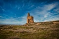 Panoramic shot of the entrance To the castle of the town of ayllon cradle on thin clouds background