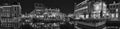 A panoramic shot of the illuminated buildings at the point where the Old Rhine and the New Rhine meet, Leiden, Netherlands