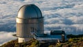 Panoramic shot of the La Palma astronomical observatory on a sea of clouds background Royalty Free Stock Photo