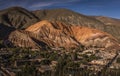 Panoramic shot of the little town of Purmamarca and the seven colours mountain -Cerro de los siete colores- in Jujuy, Argentina. Royalty Free Stock Photo