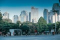 Panoramic shot of local people jogging at the Senayan Park area in the morning