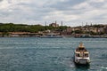Panoramic shot of the old town Istanbul; The Hagia Sophia Ayasofya Mosque Eminonu, ferries and boats on the Golden Horn,