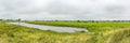 A panoramic shot of one of the many lakes in the floodplains of the river Lek and the Moerbergse Waard nature reserve in the Betuw