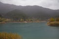 Panoramic shot of a rainy day in Lake Tsivlos Royalty Free Stock Photo