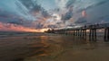 A panoramic shot of a scenic colorful sunset at the beach - Naples Pier, Florida, USA