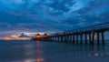 Panoramic shot of a scenic colorful sunset at the beach - Naples Pier Florida, USA Royalty Free Stock Photo