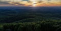 Panoramic shot of the sunset over the forest in Kordun in Croatia Royalty Free Stock Photo