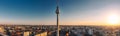 Panoramic shot of the tv tower rising above all buildings on a sunset in berlin