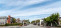 Panoramic shot of a typical street and homes on Balboa Peninsula in Newport Beach, California Royalty Free Stock Photo