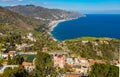 Panoramic Sicilian view of Ionian sea shore of Taormina and Mazzaro in Messina region of Sicily in Italy Royalty Free Stock Photo