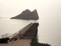 A panoramic sight of the island called `Isla del Fraile` Island of the friar in English and part of the old metal jetty in front