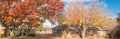 Panoramic single story bungalow houses in suburbs of Dallas with bright fall foliage colors Royalty Free Stock Photo